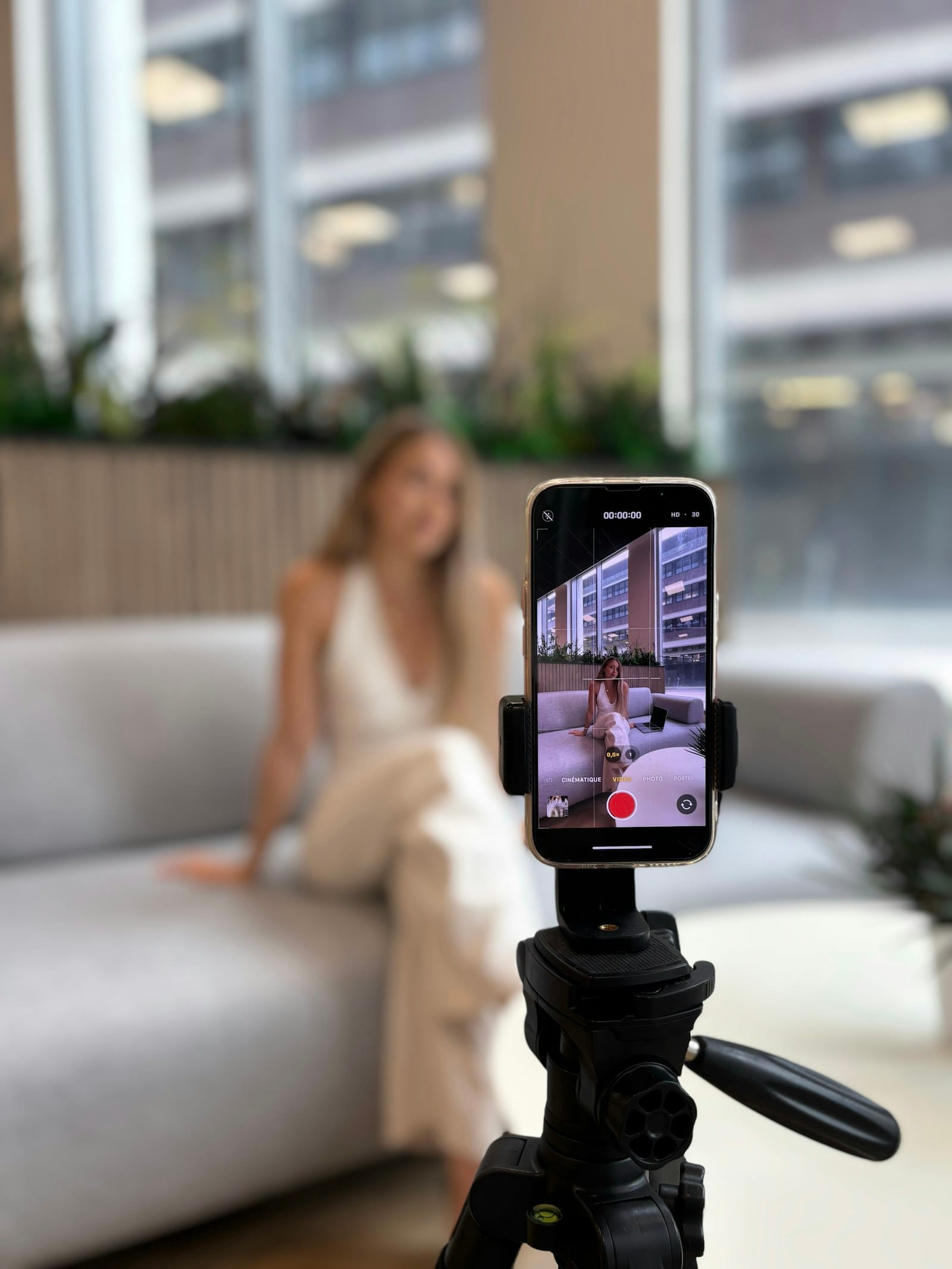 Creator filming herself on a phone