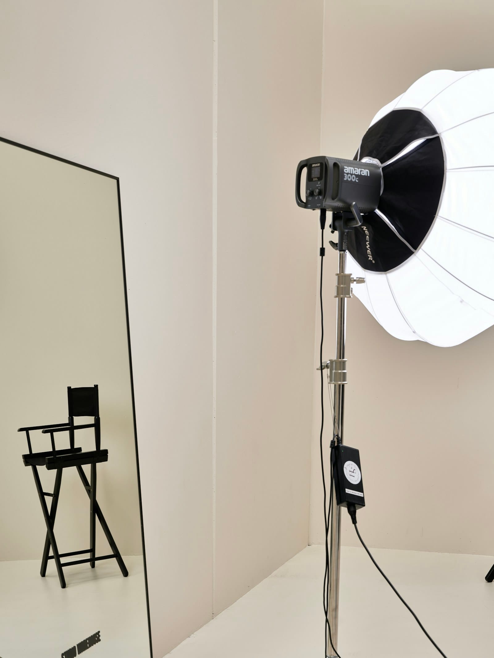 Bright studio with softbox and director's chair